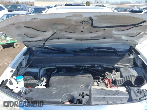 2013 Honda Pilot Touring with VIN 5FNYF3H9XDB006353, listed as a IAAI auction lot 41826557 with 174,552 mi miles and . Bid and sale history available at DreamBid. Image 10.