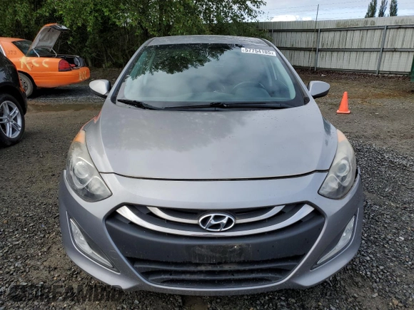 2013 Hyundai Elantra z VIN KMHD35LE3DU075234, wystawiony jako Copart lot #57754185 z przebiegiem 107 040 mil mil oraz Szkoda całkowita • Salvage title. Historia ofert i sprzedaży dostępna na DreamBid. Obrazek 5.
