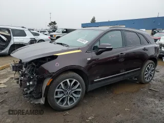 2021 Cadillac XT5 AWD Sport z VIN 1GYKNGRS4MZ123061, wystawiony jako Copart lot #84488624 z przebiegiem 36 737 mil mil oraz Czysty tytuł • Clean title. Historia ofert i sprzedaży dostępna na DreamBid. Obrazek 1.
