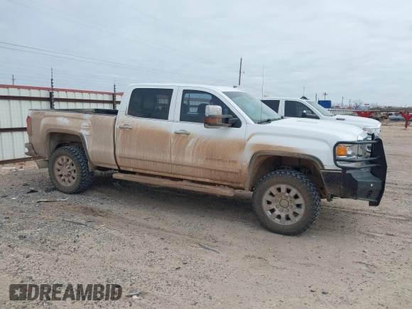 2015 GMC Sierra 2500HD available WiFi Denali with VIN 1GT120E84FF642823, listed as a IAAI auction lot 41593286 with 148,038 mi miles. Bid and sale history available at carsss.com. Image 13.