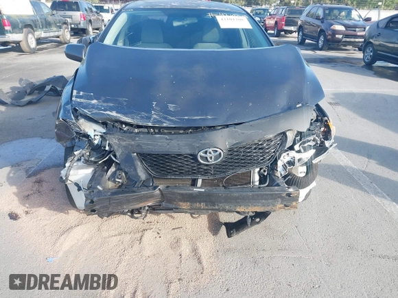 2009 Toyota Corolla with VIN 1NXBU40E29Z143324, listed as a IAAI auction lot 42101208 with 237,763 mi miles. Bid and sale history available at carsss.com. Image 6.