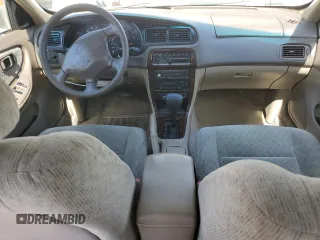 2000 Nissan Altima XE z VIN 1N4DL01D5YC243801, wystawiony jako Copart lot #52642985 z przebiegiem 237 665 mil mil oraz Szkoda całkowita • Salvage title. Historia ofert i sprzedaży dostępna na DreamBid. Obrazek 8.