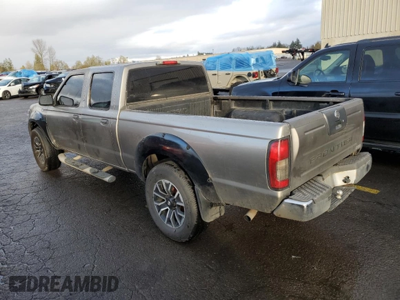 2003 Nissan Frontier XE with VIN 1N6ED29X03C445019, listed as a Copart auction lot 45687565 with 191,290 mi miles and Salvage title. Bid and sale history available at DreamBid. Image 2.
