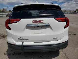 2020 GMC Terrain SLE z VIN 3GKALTEV0LL204536, wystawiony jako Copart lot #54000265 z przebiegiem 61 666 mil mil oraz Szkody całkowita. Historia ofert i sprzedaży dostępna na DreamBid. Obrazek 6.