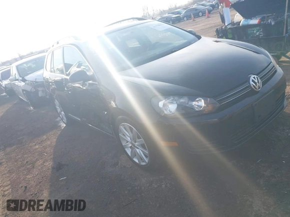 2012 Volkswagen Jetta SportWagen TDI with VIN 3VWPL7AJ8CM702152, listed as a IAAI auction lot 41770833 with 129,621 mi miles. Bid and sale history available at carsss.com. Image 1.