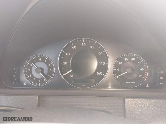 2005 Mercedes-Benz CLK-Class 5.0L with VIN WDBTJ75J35F142835, listed as a IAAI auction lot 41836593 with 1 mi miles. Bid and sale history available at carsss.com. Image 7.