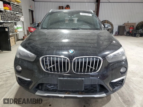 2018 BMW X1 xDrive28i with VIN WBXHT3C37J5L30341, listed as a Copart auction lot 42691505 with 84,523 mi miles and Salvage Title. Bid and sale history available at carsss.com. Image 5.