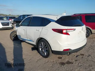 2020 Acura RDX w/Technology Pkg with VIN 5J8TC1H54LL004454, listed as a IAAI auction lot 41506984 with 65,180 mi miles. Bid and sale history available at carsss.com. Image 3.