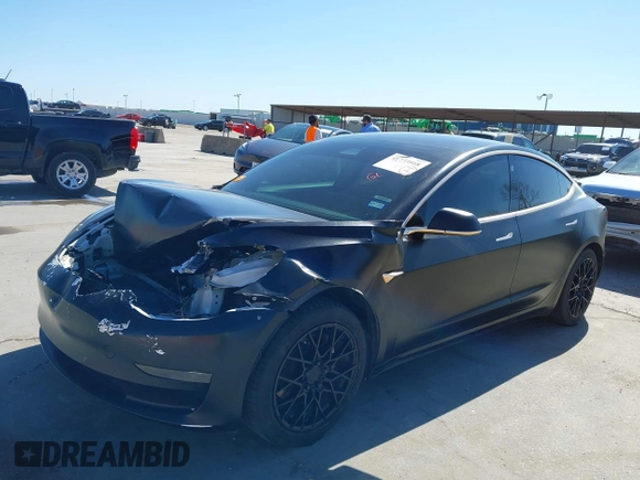 2020 Tesla Model 3 Standard Range Plus with VIN 5YJ3E1EA0LF597761, listed as a IAAI auction lot 41773918 with 89,957 mi miles. Bid and sale history available at carsss.com. Image 19.
