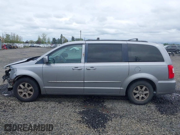 2013 Chrysler Town & Country Touring with VIN 2C4RC1BG2DR656629, listed as a IAAI auction lot 42024459 with 209,472 mi miles and . Bid and sale history available at DreamBid. Image 15.