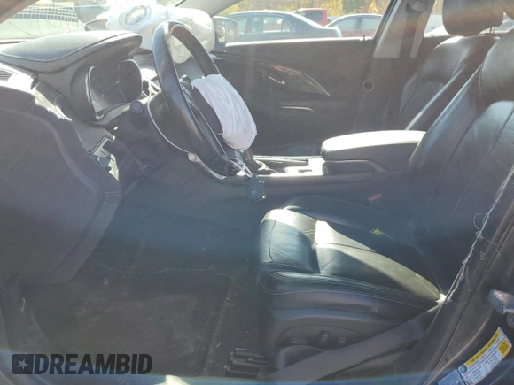 2014 Buick LaCrosse Leather with VIN 1G4GC5G37EF291003, listed as a Copart auction lot 76665934 with 217,036 mi miles and Salvage title. Bid and sale history available at DreamBid. Image 7.