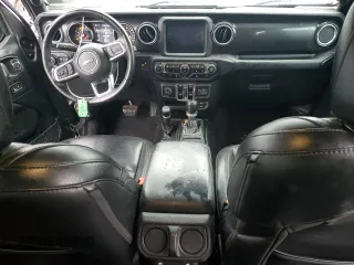 2020 Jeep Wrangler Unlimited Sahara Altitude with VIN 1C4HJXEM5LW293741, listed as a Copart auction lot 58801565 with 97,460 mi miles and Salvage title. Bid and sale history available at DreamBid. Image 8.