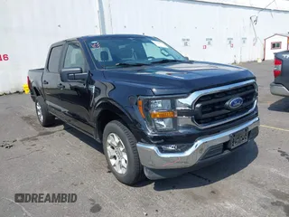 2023 Ford F-150 XL with VIN 1FTEW1C88PKE14766, listed as a IAAI auction lot 42581598 with 34,476 mi miles and . Bid and sale history available at DreamBid. Image 1.