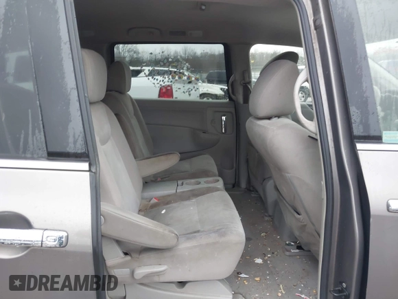 2014 Nissan Quest S with VIN JN8AE2KP0E9107133, listed as a IAAI auction lot 41561516 with 227,656 mi miles and . Bid and sale history available at DreamBid. Image 8.