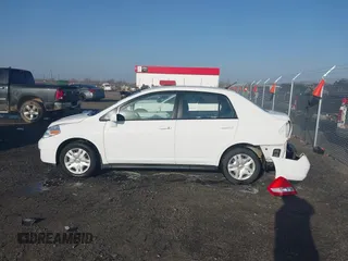 2011 Nissan Versa S with VIN 3N1BC1AP9BL358580, listed as a IAAI auction lot 41801830 with 102,611 mi miles and . Bid and sale history available at DreamBid. Image 14.