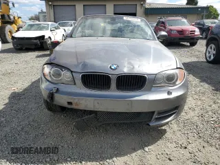 2009 BMW 1 Series 128i with VIN WBAUL73509VJ76763, listed as a Copart auction lot 66763214 with 83,954 mi miles and Salvage Title. Bid and sale history available at DreamBid. Image 5.