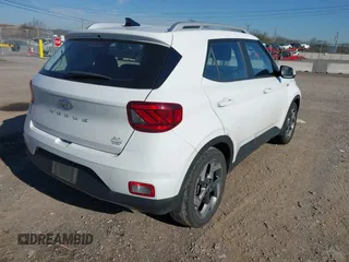 2022 Hyundai Venue SEL with VIN KMHRC8A32NU163864, listed as a IAAI auction lot 41814492 with 99,957 mi miles and . Bid and sale history available at DreamBid. Image 4.