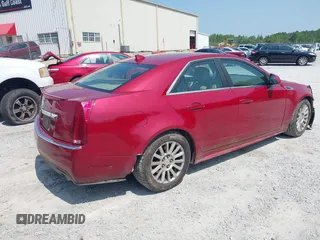 2010 Cadillac CTS Luxury with VIN 1G6DE5EG4A0107482, listed as a IAAI auction lot 42376922 with 161,404 mi miles and . Bid and sale history available at DreamBid. Image 4.