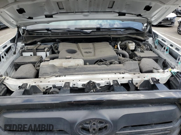 2022 Toyota Tundra SR z VIN 5TFKB5AA5NX008200, wystawiony jako Copart lot #51174545 z przebiegiem 51 898 mil mil oraz Szkoda całkowita • Salvage title. Historia ofert i sprzedaży dostępna na DreamBid. Obrazek 11.