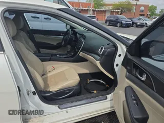 2018 Nissan Maxima SL z VIN 1N4AA6AP2JC371232, wystawiony jako Copart lot #54703405 z przebiegiem 142 447 mil mil oraz Czysty tytuł • Clean title. Historia ofert i sprzedaży dostępna na DreamBid. Obrazek 5.