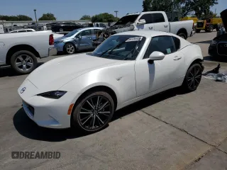 2024 Mazda MX-5 Miata Grand Touring z VIN JM1NDAM76R0602972, wystawiony jako Copart lot #59336405 z przebiegiem 4 965 mil mil oraz Szkoda całkowita • Salvage title. Historia ofert i sprzedaży dostępna na DreamBid. Obrazek 1.