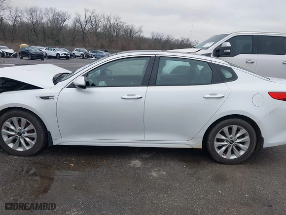 2016 Kia Optima EX with VIN 5XXGU4L30GG120518, listed as a IAAI auction lot 41602190 with 116,268 mi miles. Bid and sale history available at carsss.com. Image 14.