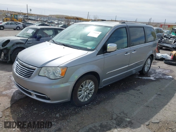 2013 Chrysler Town & Country Limited with VIN 2C4RC1GGXDR548106, listed as a IAAI auction lot 41890220 with 189,908 mi miles. Bid and sale history available at carsss.com. Image 2.