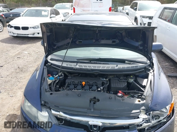 2006 Honda Civic LX z VIN 1HGFA16526L029332, wystawiony jako IAAI lot #41752392 z przebiegiem 123 928 mil mil oraz . Historia ofert i sprzedaży dostępna na DreamBid. Obrazek 10.