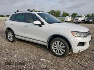 2012 Volkswagen Touareg Sport z VIN WVGEF9BP4CD007058, wystawiony jako Copart lot #56971745 z przebiegiem 181 221 mil mil oraz Czysty tytuł • Clean title. Historia ofert i sprzedaży dostępna na DreamBid. Obrazek 4.