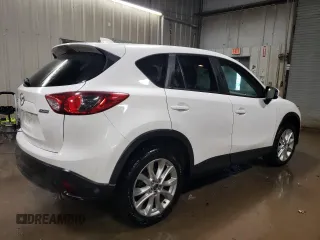 2014 Mazda CX-5 Grand Touring with VIN JM3KE4DY7E0417308, listed as a Copart auction lot 88161195 with 107,493 mi miles and Salvage Title. Bid and sale history available at carsss.com. Image 3.