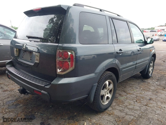 2006 Honda Pilot EX-L with VIN 5FNYF28536B028298, listed as a IAAI auction lot 42104705 with 244,790 mi miles. Bid and sale history available at carsss.com. Image 4.