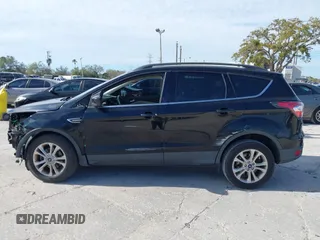 2017 Ford Escape SE with VIN 1FMCU0GDXHUB56573, listed as a IAAI auction lot 41694558 with 145,902 mi miles. Bid and sale history available at carsss.com. Image 15.