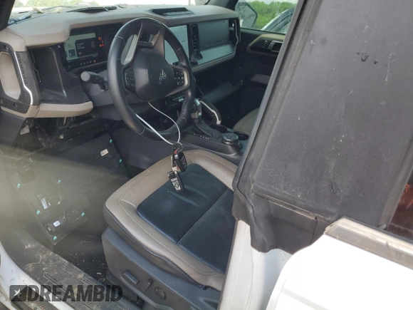 2022 Ford Bronco с VIN 1FMEE5DP6NLB41068, выставлен на аукционе Copart как лот 50778505 с пробегом 70 431 миль миль и Списание • Salvage title. История ставок и продаж доступна на DreamBid. Изображение 7.