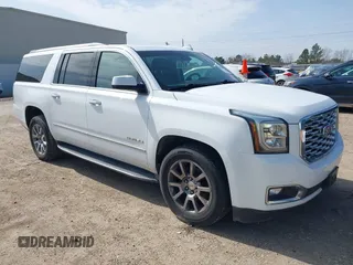 2019 GMC Yukon XL Denali with VIN 1GKS1HKJ8KR378385, listed as a IAAI auction lot 41580041 with 115,481 mi miles. Bid and sale history available at carsss.com. Image 1.
