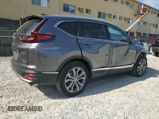 2020 Honda CR-V Touring with VIN 2HKRW2H96LH677520, listed as a Copart auction lot 52264155 with 33,909 mi miles and Salvage Title. Bid and sale history available at DreamBid. Image 3.