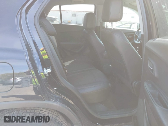 2022 Chevrolet Trax LT with VIN KL7CJPSM7NB568709, listed as a IAAI auction lot 42061802 with 28,995 mi miles and . Bid and sale history available at DreamBid. Image 8.