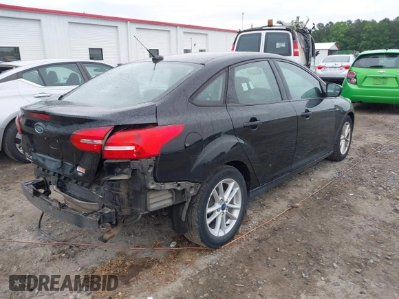 2018 Ford Focus SE with VIN 1FADP3F2XJL206441, listed as a IAAI auction lot 42341641 with 189,260 mi miles and . Bid and sale history available at DreamBid. Image 4.