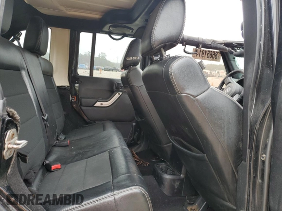 2012 Jeep Wrangler Unlimited Rubicon with VIN 1C4HJWFG7CL205244, listed as a Copart auction lot 86651914 with Not provided miles and Salvage title. Bid and sale history available at DreamBid. Image 11.