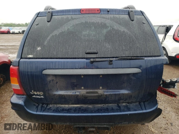 2004 Jeep Grand Cherokee Laredo с VIN 1J4GW48S94C258963, выставлен на аукционе Copart как лот 57390035 с пробегом 179 385 миль миль и Списание • Salvage title. История ставок и продаж доступна на DreamBid. Изображение 6.