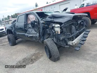 2018 Toyota Tacoma SR5 with VIN 3TMDZ5BN4JM047379, listed as a IAAI auction lot 39529466 with Not provided miles and . Bid and sale history available at DreamBid. Image 1.