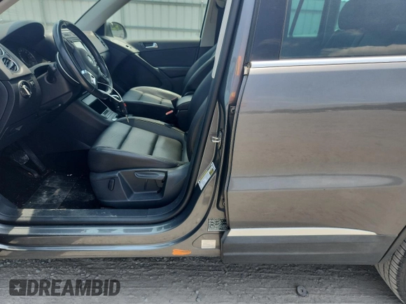2013 Volkswagen Tiguan SE with VIN WVGBV7AX8DW011356, listed as a Copart auction lot 58099355 with 99,513 mi miles and Salvage title. Bid and sale history available at DreamBid. Image 13.