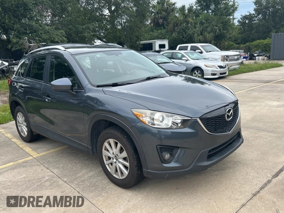 2013 Mazda CX-5 Sport with VIN JM3KE4BE7D0141588, listed as a Copart auction lot 66138585 with 124,920 mi miles and Clean title. Bid and sale history available at DreamBid. Image 1.