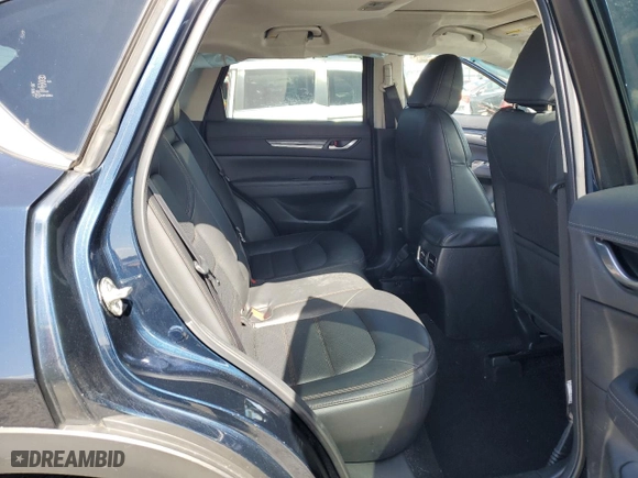 2017 Mazda CX-5 Grand Touring with VIN JM3KFBDL1H0207491, listed as a Copart auction lot 51382575 with 76,113 mi miles and Salvage Title. Bid and sale history available at carsss.com. Image 11.
