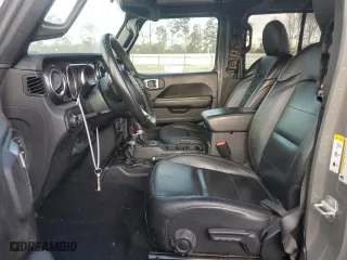 2020 Jeep Wrangler Unlimited Sahara with VIN 1C4HJXENXLW105210, listed as a Copart auction lot 79345214 with 74,480 mi miles and Salvage Title. Bid and sale history available at carsss.com. Image 7.