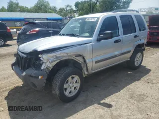 2003 Jeep Liberty Sport z VIN 1J4GK48K43W657028, wystawiony jako Copart lot #55070315 z przebiegiem 243 019 mil mil oraz Szkody całkowita. Historia ofert i sprzedaży dostępna na DreamBid. Obrazek 1.