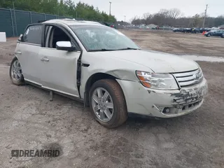 2008 Ford Taurus Limited with VIN 1FAHP25W18G121135, listed as a IAAI auction lot 36254053 with 51,000 mi miles. Bid and sale history available at carsss.com. Image 1.