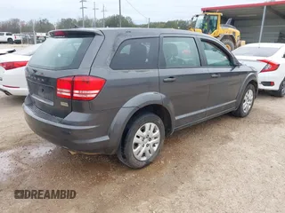 2014 Dodge Journey American Value Pkg with VIN 3C4PDCAB7ET247286, listed as a IAAI auction lot 41214056 with 205,222 mi miles. Bid and sale history available at carsss.com. Image 4.