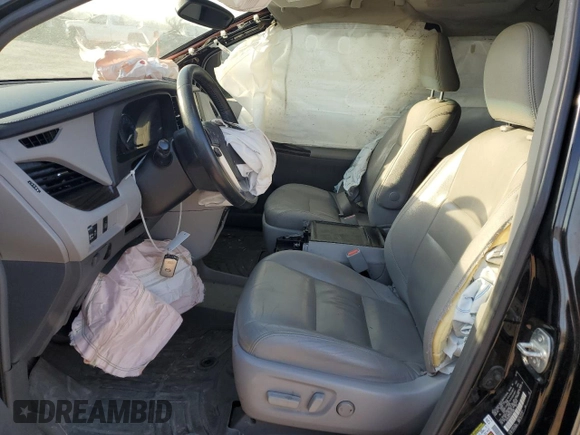 2015 Toyota Sienna XLE с VIN 5TDYK3DC2FS573488, выставлен на аукционе Copart как лот 44770774 с пробегом 158 502 миль миль и Списание • Salvage title. История ставок и продаж доступна на DreamBid. Изображение 7.