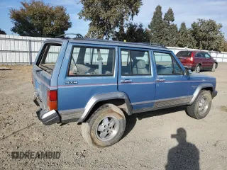 1991 Jeep Cherokee with VIN 1J4FJ58S1ML520376, listed as a Copart auction lot 75452364 with 147,982 mi miles and Salvage title. Bid and sale history available at DreamBid. Image 3.