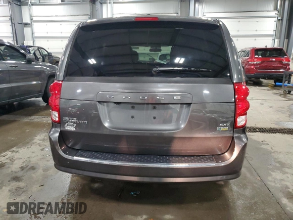 2015 Dodge Grand Caravan SXT with VIN 2C4RDGCG5FR622086, listed as a Copart auction lot 51769155 with 217,538 mi miles and Salvage Title. Bid and sale history available at DreamBid. Image 6.